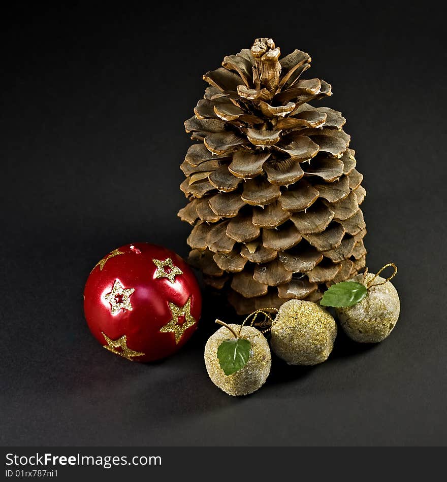 Decorative Christmas ball,cone and three small paradise apples. Decorative Christmas ball,cone and three small paradise apples