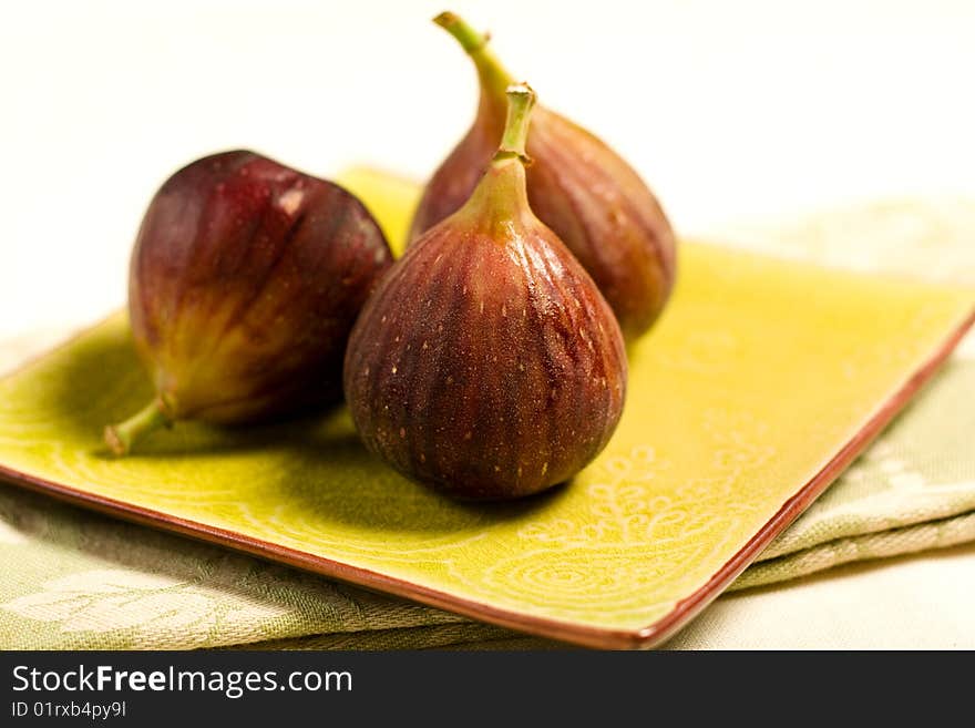 Golden figs resting on napkin. Golden figs resting on napkin