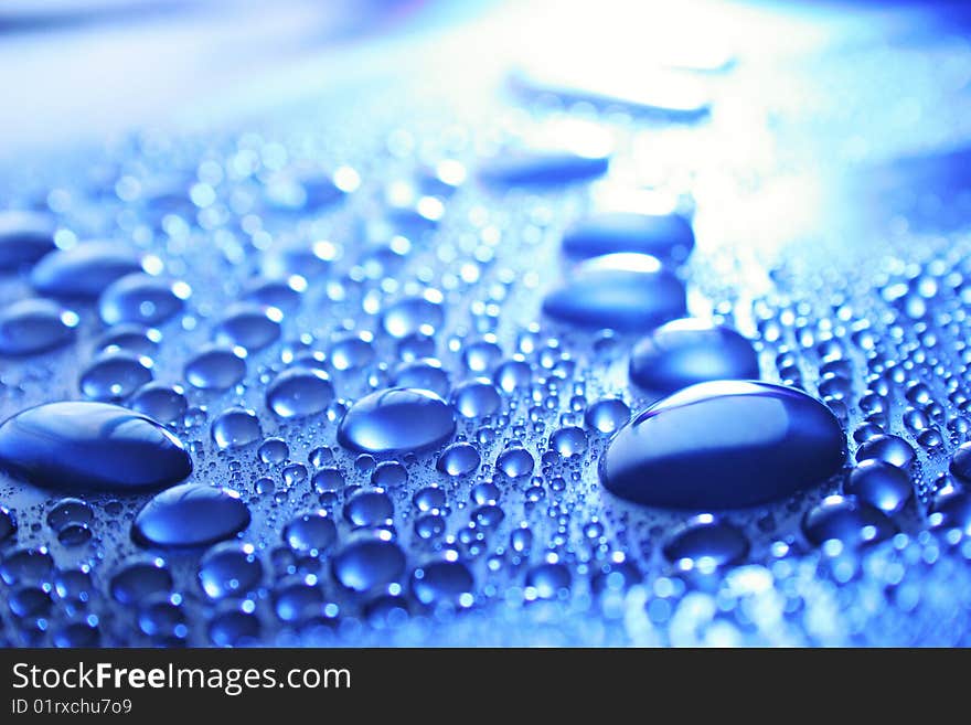 Drops On A Blue Surface