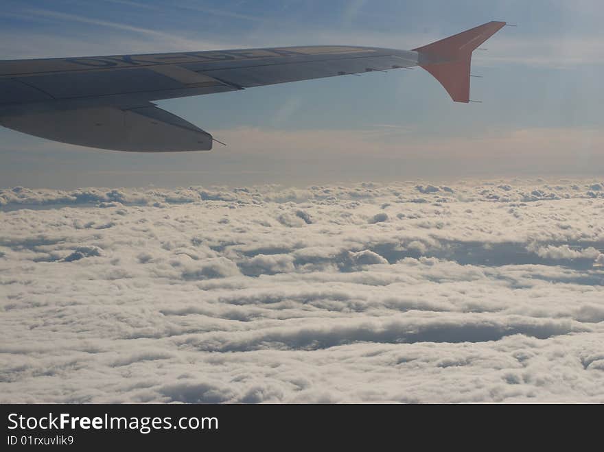 Wing And Clouds