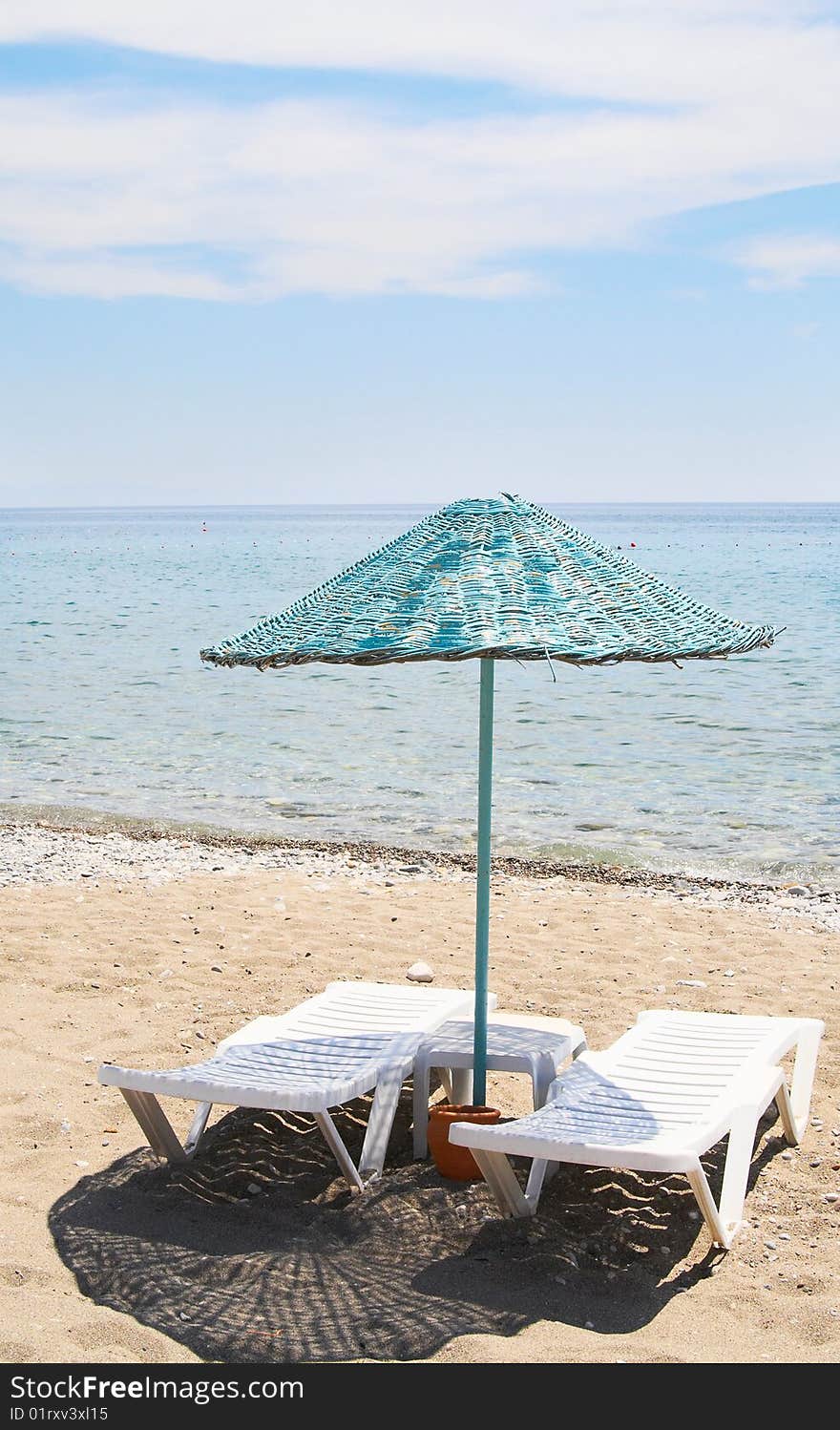 Splendid parasol and beach in resort.