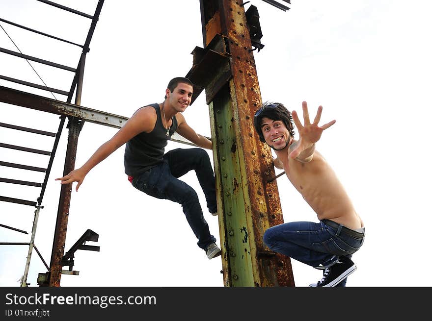 Portrait of two young trendy male friends - isolated. Portrait of two young trendy male friends - isolated