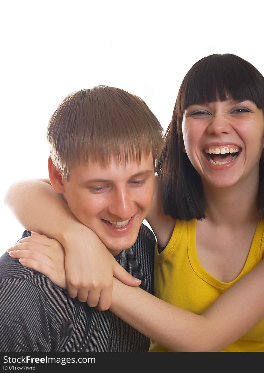 Portrait of young happy pair on a white background. Portrait of young happy pair on a white background