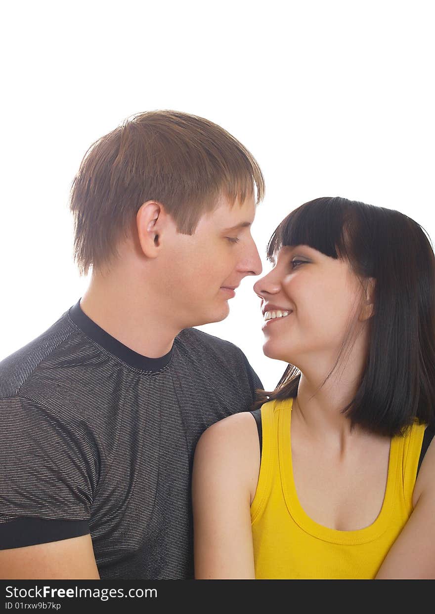 Portrait of young happy pair on a white background. Portrait of young happy pair on a white background