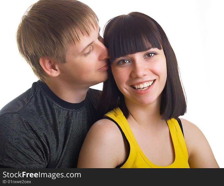 Portrait of young happy pair on a white background. Portrait of young happy pair on a white background