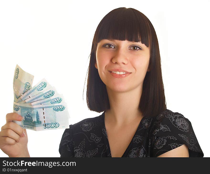 The young girl holds in hands Russian money for a white background. The young girl holds in hands Russian money for a white background