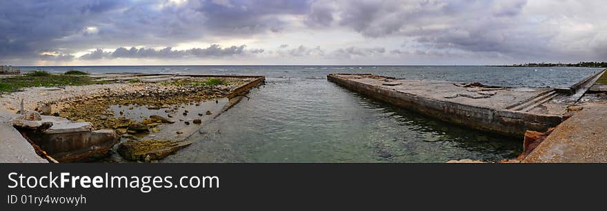 Panoramic view of coast with stormy clouds at sunset, sta Fe beach, cuba. Panoramic view of coast with stormy clouds at sunset, sta Fe beach, cuba