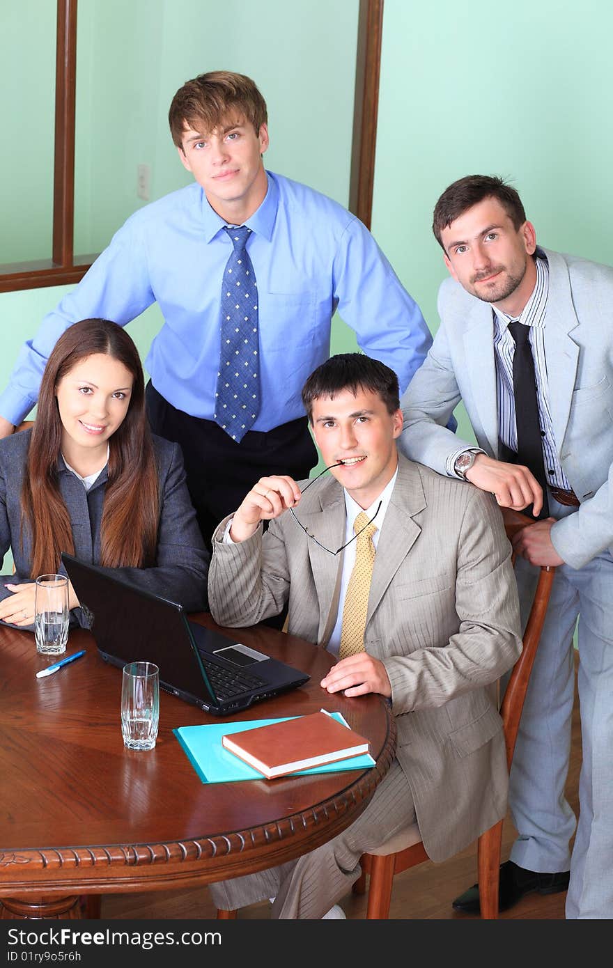 Business theme: business people in a work process in office. Business theme: business people in a work process in office.