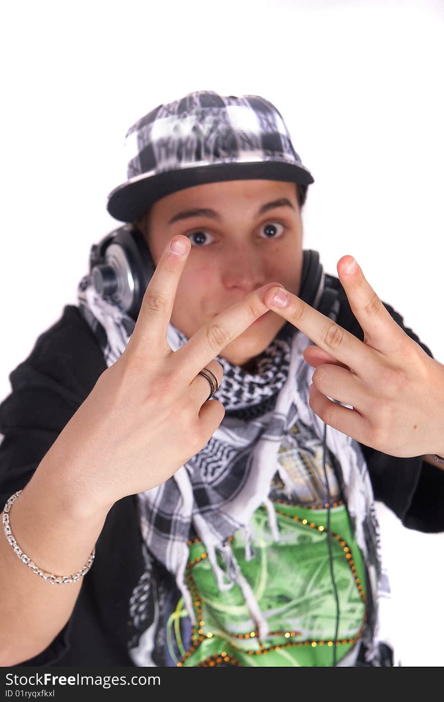 A young DJ is showing a W at the camera. Focus is on the fingers. Isolated over white. A young DJ is showing a W at the camera. Focus is on the fingers. Isolated over white.