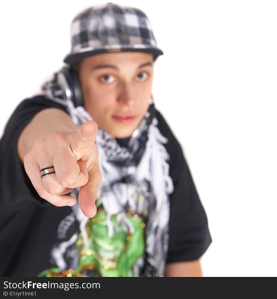 A young DJ is pointing at the camera. Isolated over white. A young DJ is pointing at the camera. Isolated over white.