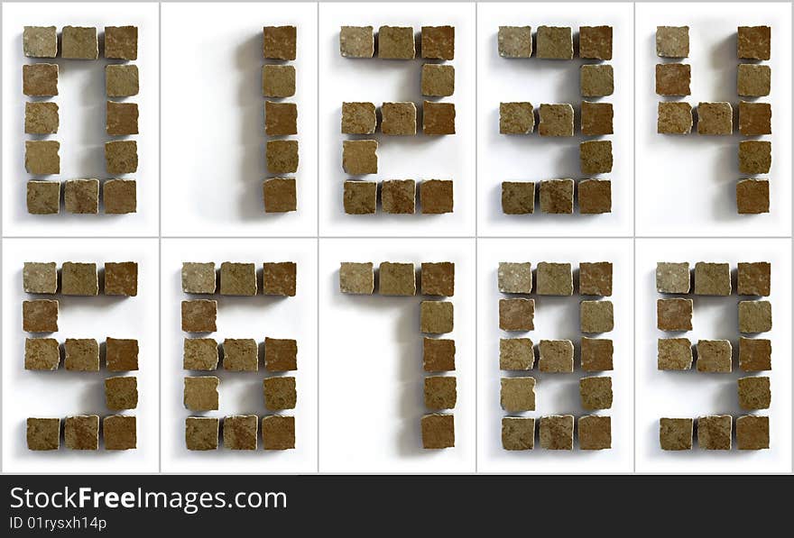 Set of digits of ceramic tiles on white background. Set of digits of ceramic tiles on white background