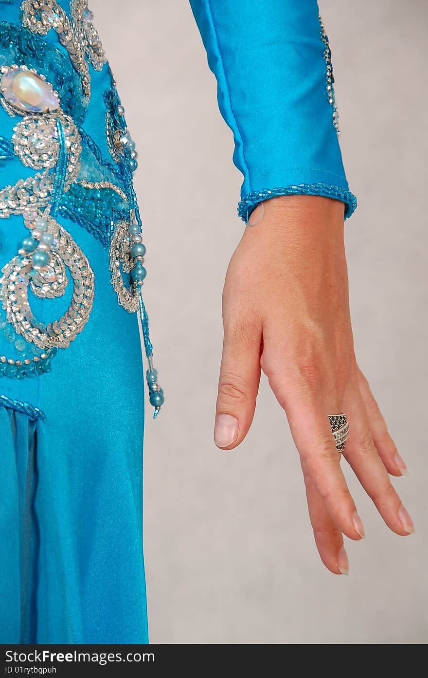 Belly-dancer in traditional turquoise blue attire. Belly-dancer in traditional turquoise blue attire