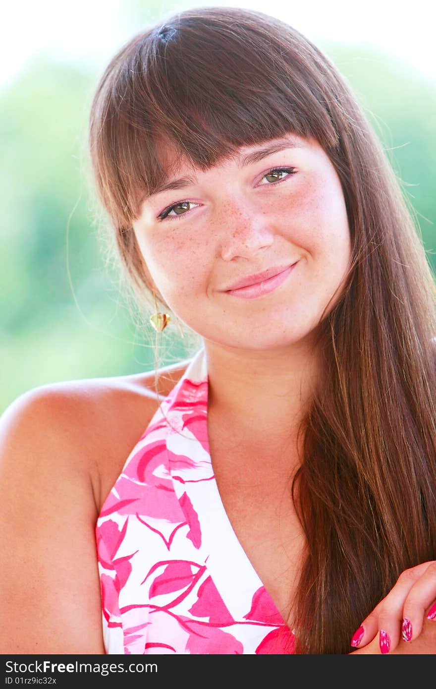 Outdoor portrait of attactive young girl