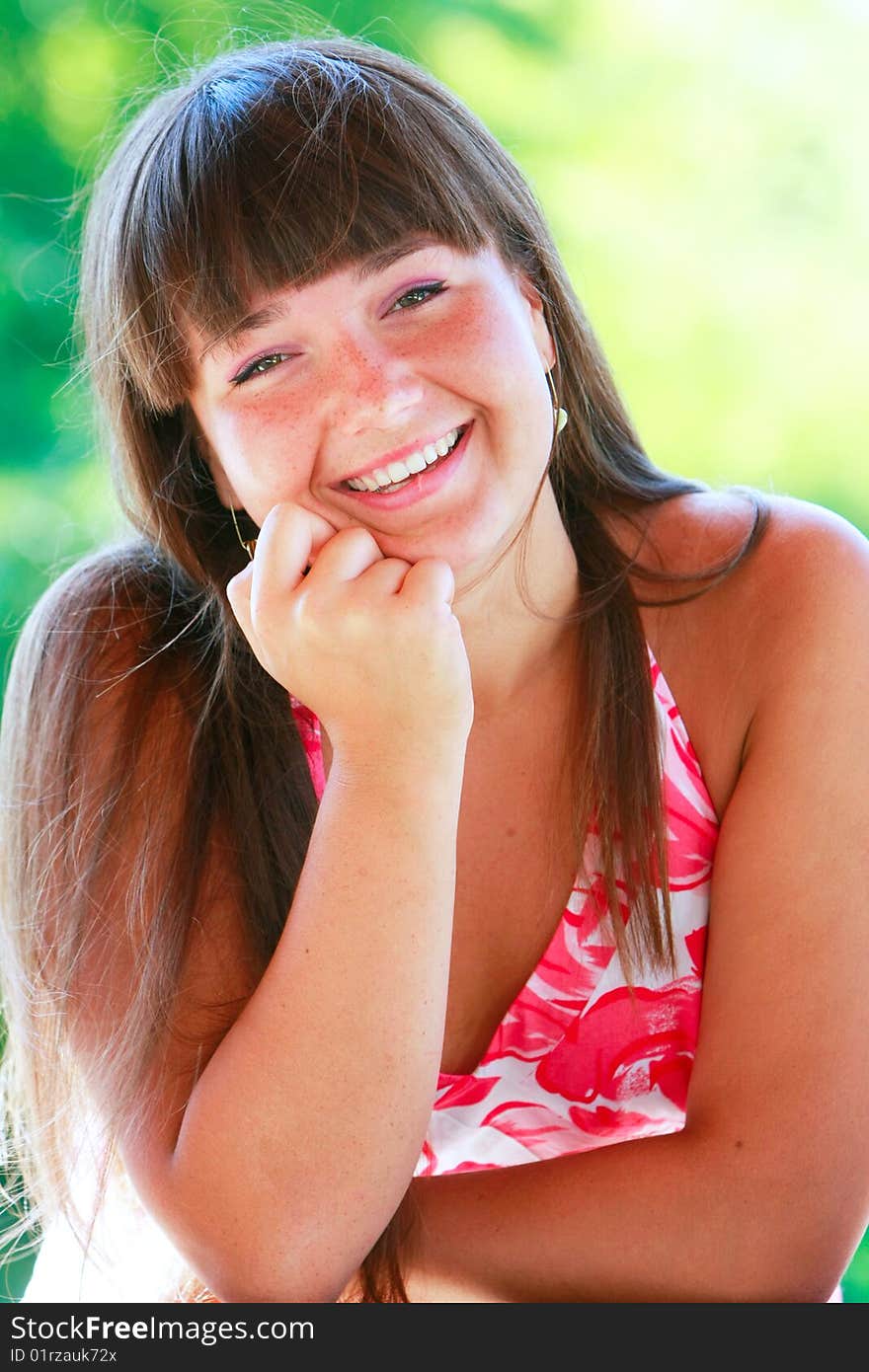 Outdoor portrait of happy girl