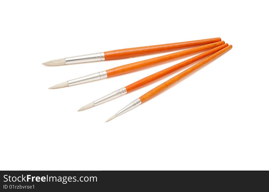 Four paintbrushes isolated