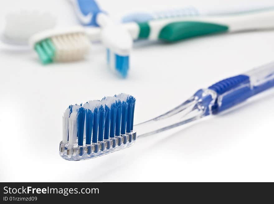 Toothbrush with other toothbrushes