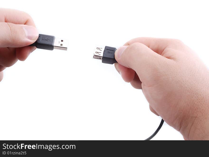 Usb cabel in two mail hands preparing. Usb cabel in two mail hands preparing