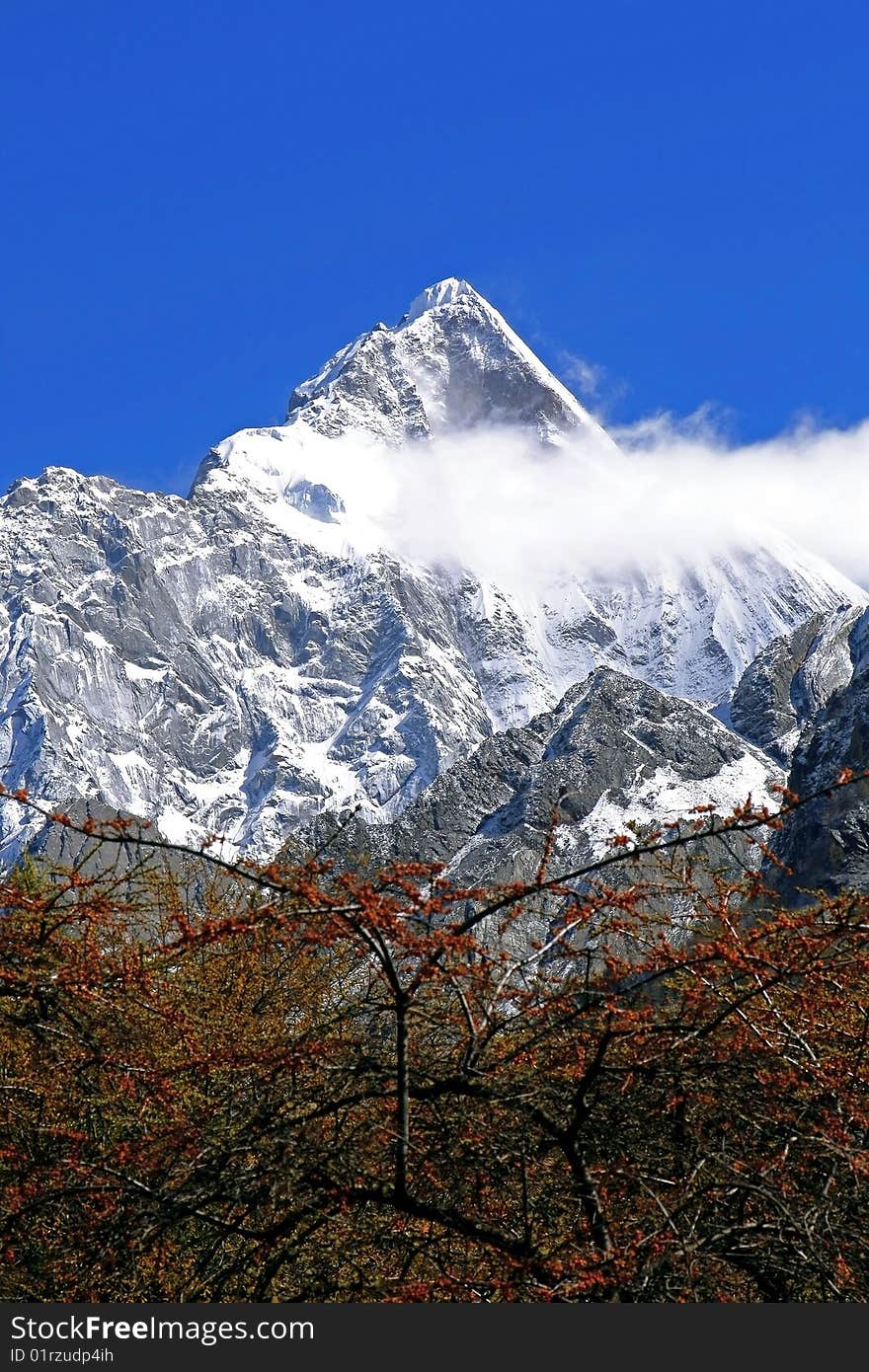 The highest peak of Siguniang Mountains which is consisted of four snow mountains located in Aba, Sichuan, China. The highest peak of Siguniang Mountains which is consisted of four snow mountains located in Aba, Sichuan, China