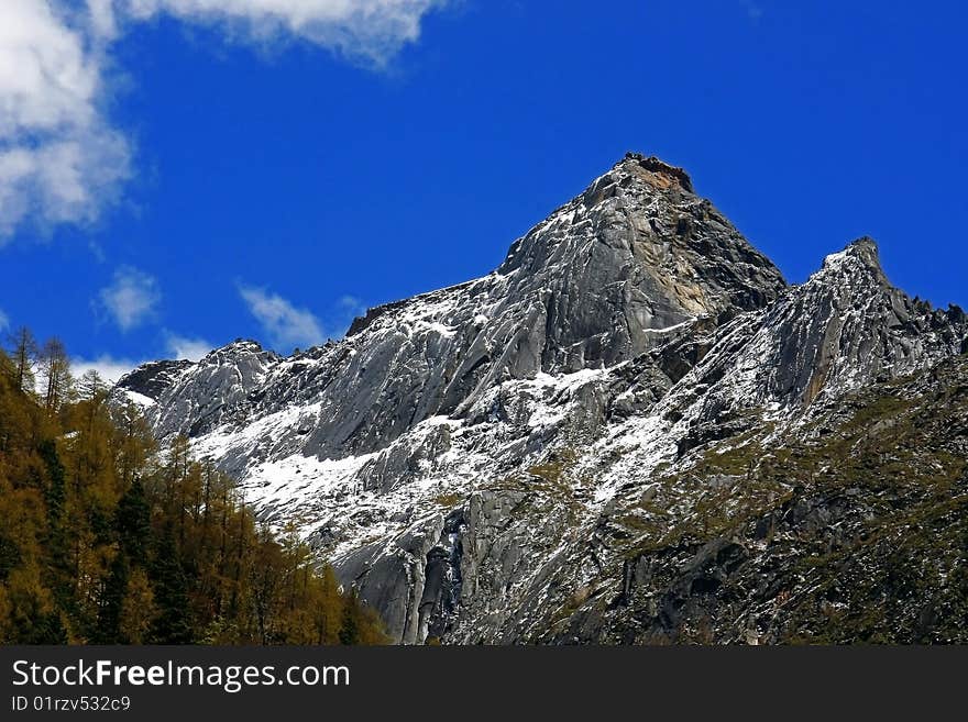 One of the peaks of Siguniang Mountains which is consisted of four snow mountains located in Aba, Sichuan, China. One of the peaks of Siguniang Mountains which is consisted of four snow mountains located in Aba, Sichuan, China