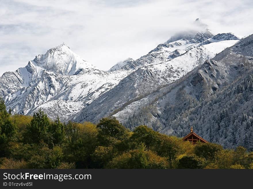 Two peaks of Siguniang Mountains which is consisted of four snow mountains located in Aba, Sichuan, China. Two peaks of Siguniang Mountains which is consisted of four snow mountains located in Aba, Sichuan, China