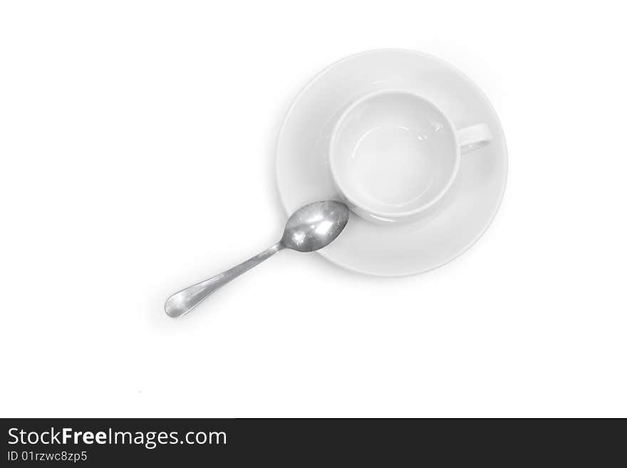 in the picture depicts a cup, saucer and spoon. in the picture depicts a cup, saucer and spoon