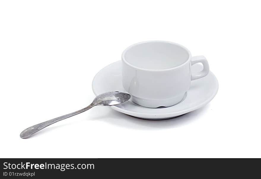 In the picture depicts a cup, saucer and spoon. In the picture depicts a cup, saucer and spoon