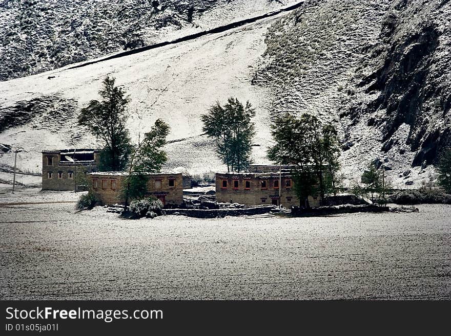 Snow view of tibetan village at Shangri-la China