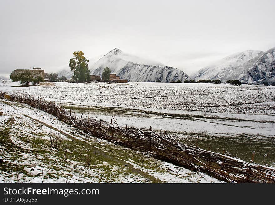 Snow view of tibetan village at Shangri-la China