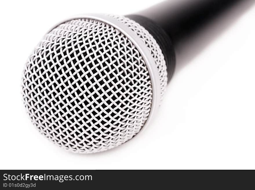 Closed - up microphone isolated on white background. Closed - up microphone isolated on white background