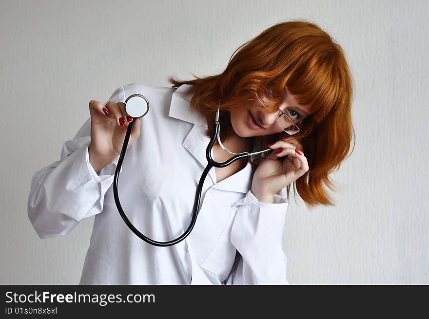 Female doctor showing off her stethoscope