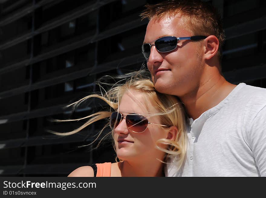 Young woman and young man with sunglasses. Young woman and young man with sunglasses