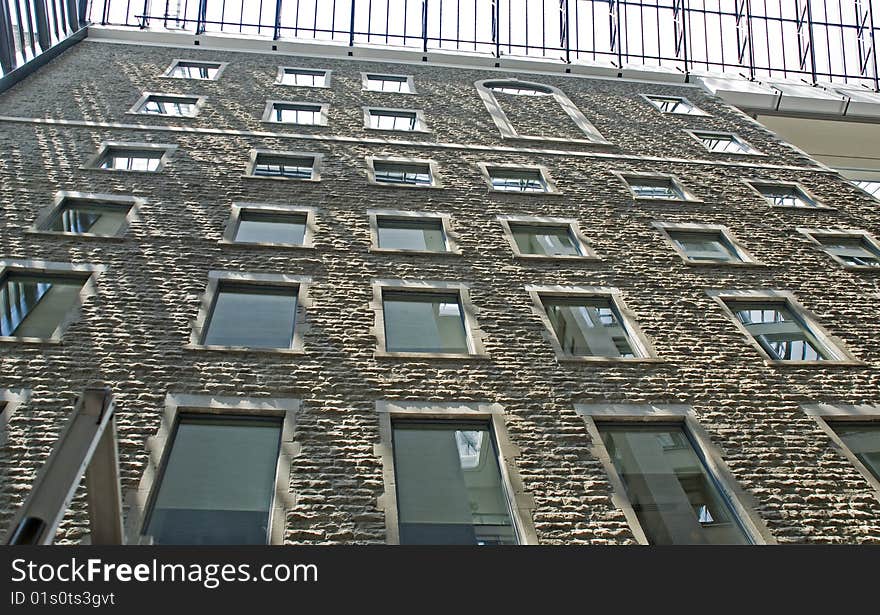 Textured brick wall with windows in World Commerce Center, Montreal, Canada