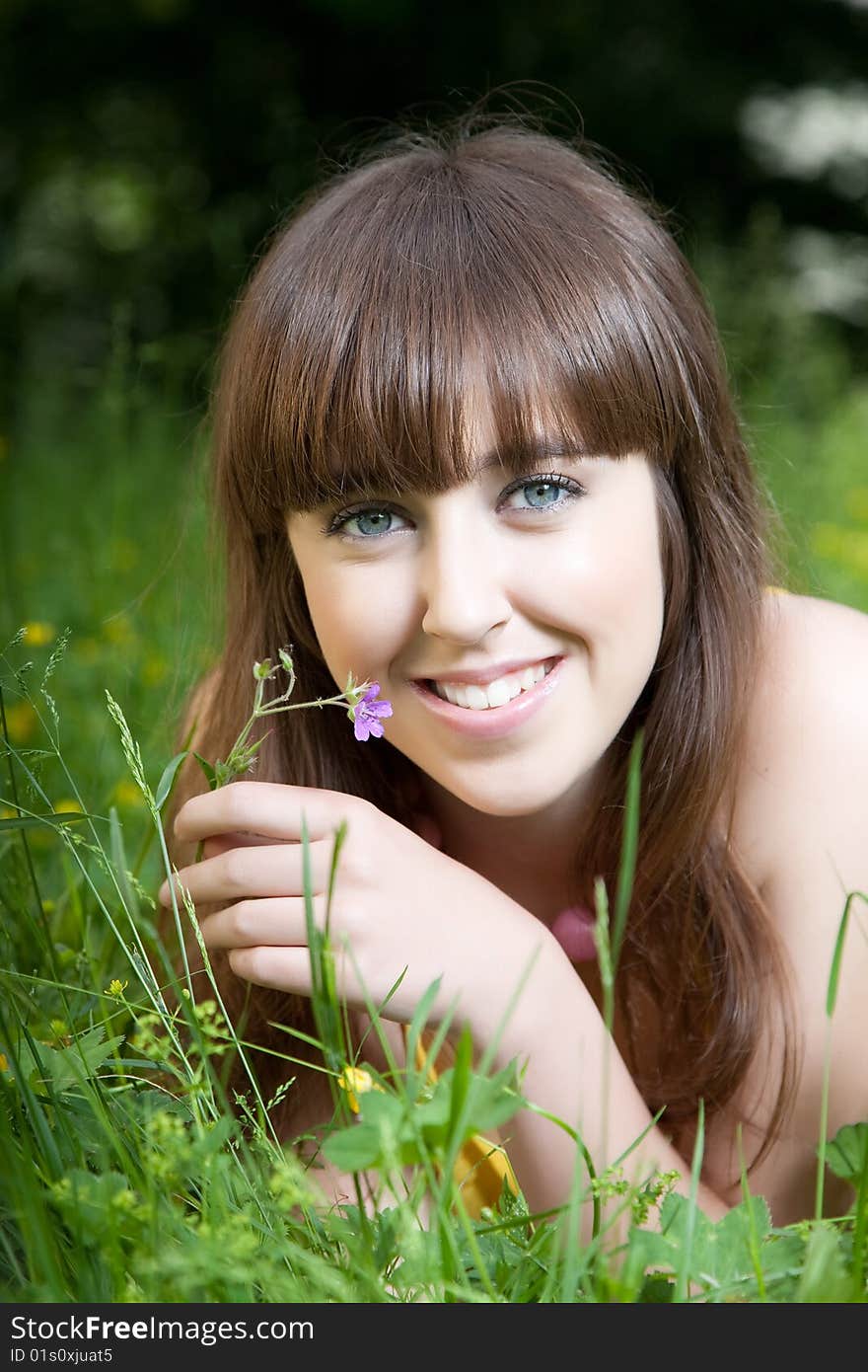 Beautiful Woman Relaxing At Park