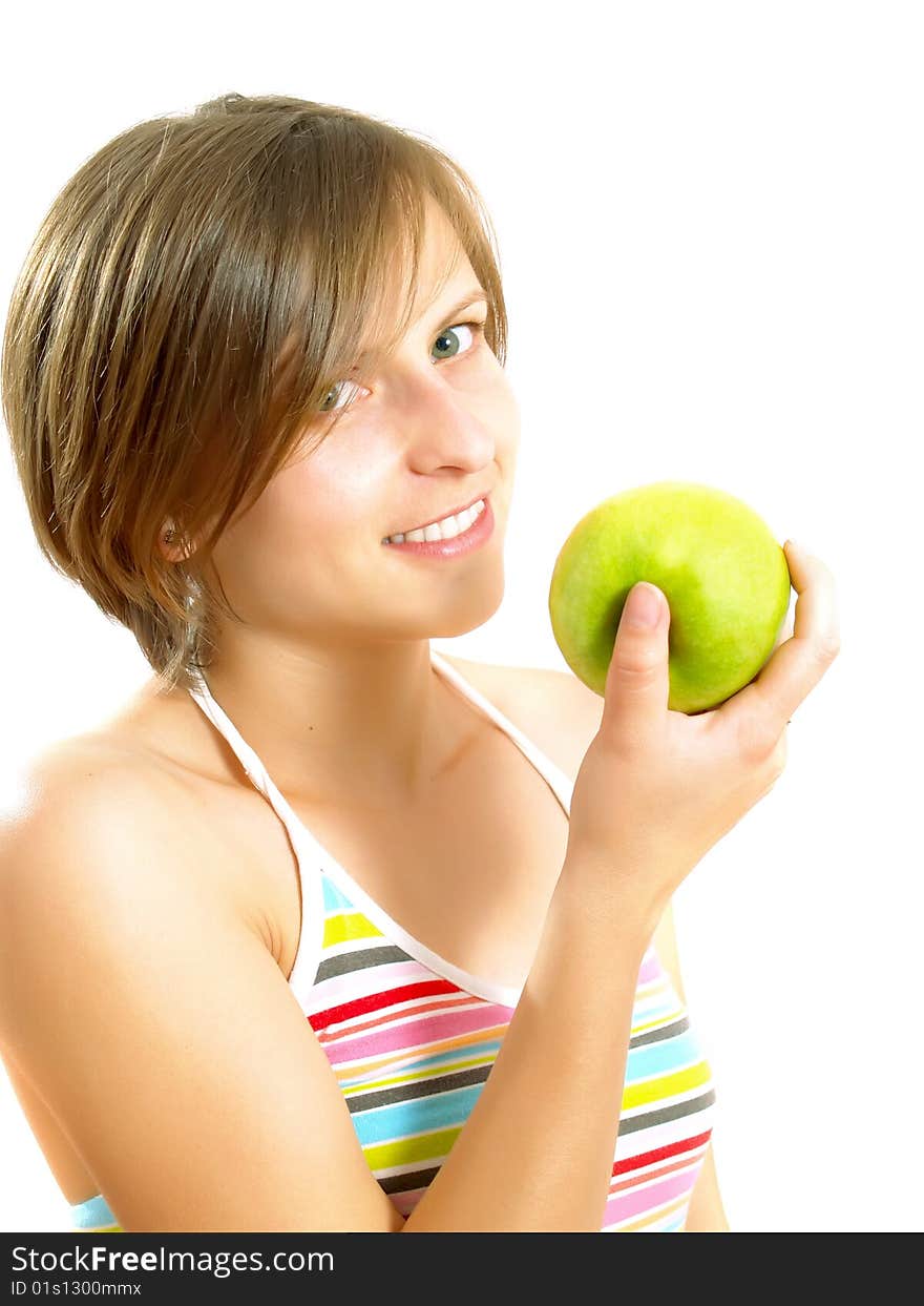 Portrait of a young pretty Caucasian blond woman with a nice colorful striped dress who is smiling and she is holding a green apple in her hand. Isolated on white. Portrait of a young pretty Caucasian blond woman with a nice colorful striped dress who is smiling and she is holding a green apple in her hand. Isolated on white.