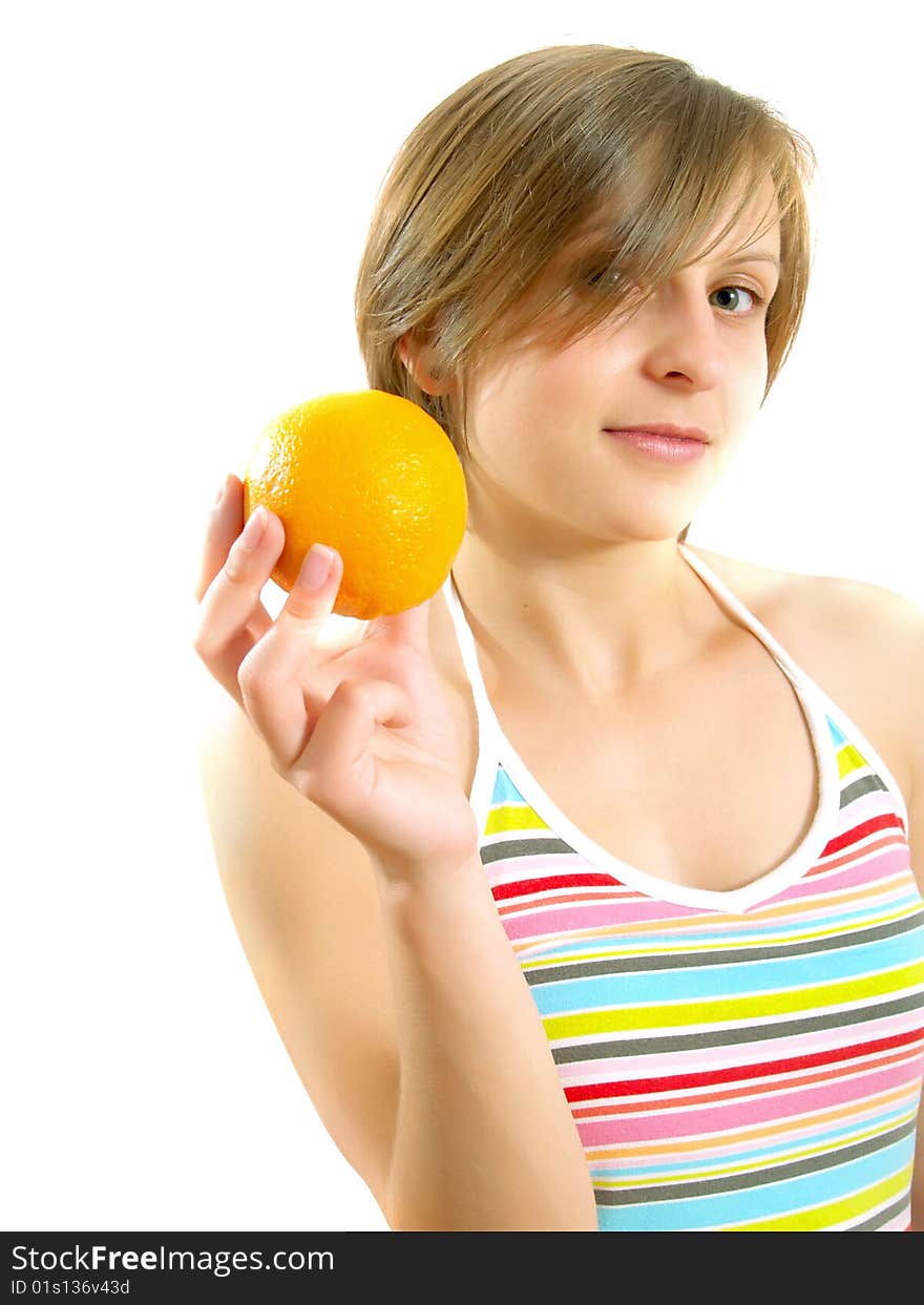 Portrait of a cute Caucasian blond girl with a nice colorful striped summer dress who is smiling and she is holding a fresh orange in her hand. Isolated on white. Portrait of a cute Caucasian blond girl with a nice colorful striped summer dress who is smiling and she is holding a fresh orange in her hand. Isolated on white.