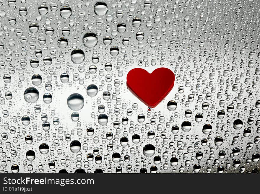 Paper red heart with water drops. Paper red heart with water drops