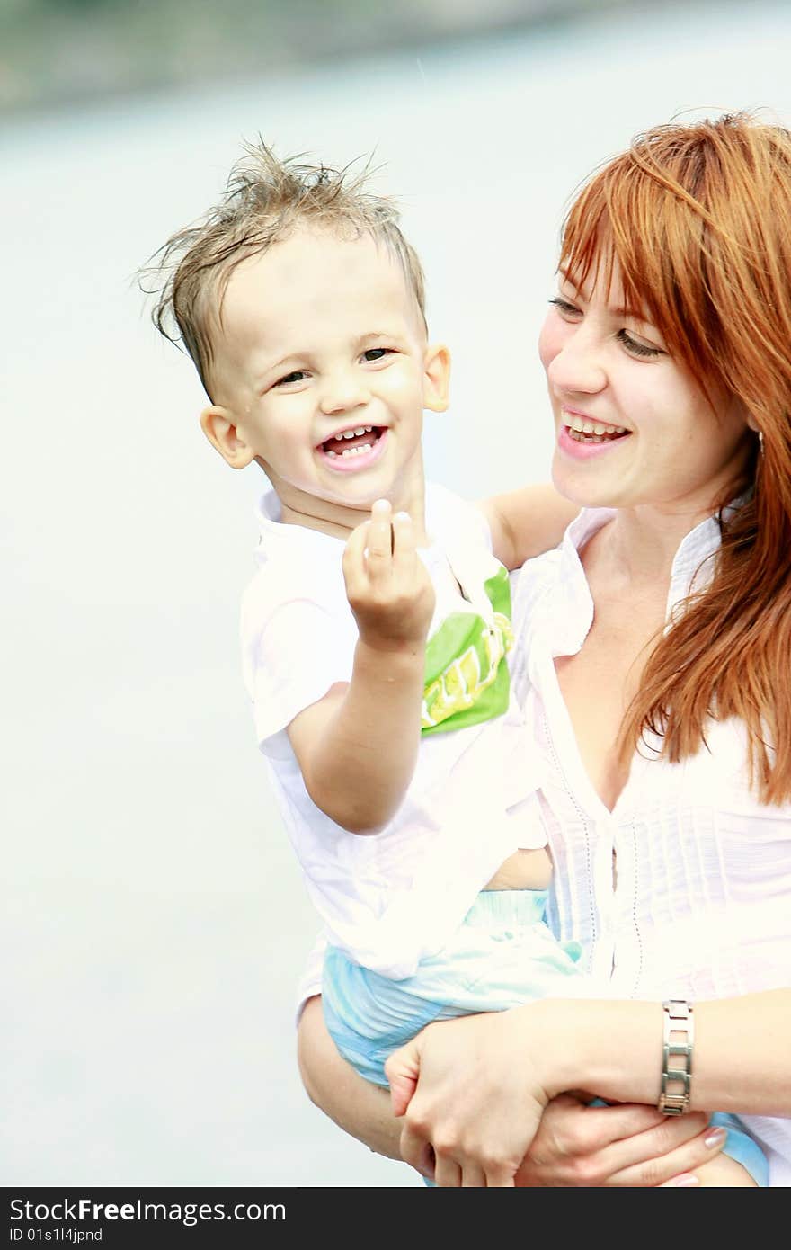 Happy mother and son outdoors