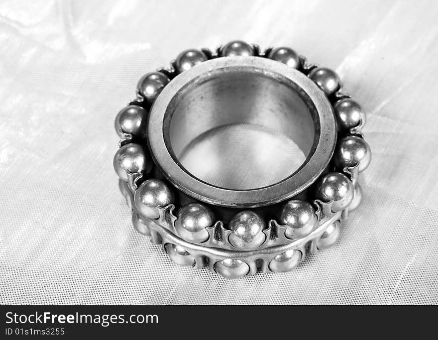 Ball bearing on silver background