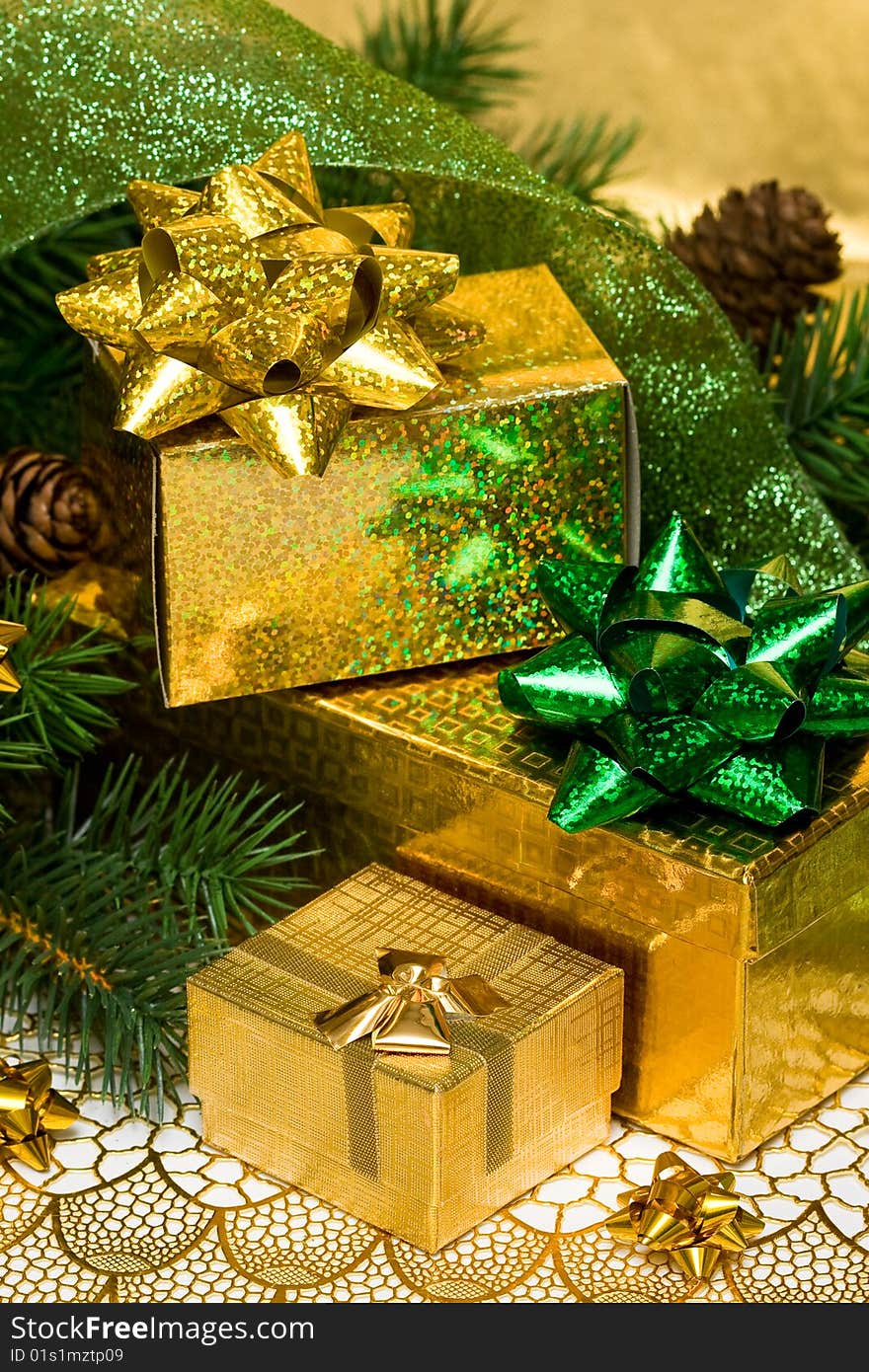 Gold gift boxes with Christmas tree