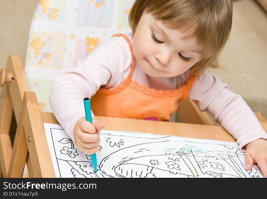 Sweet toddler baby girl drawing