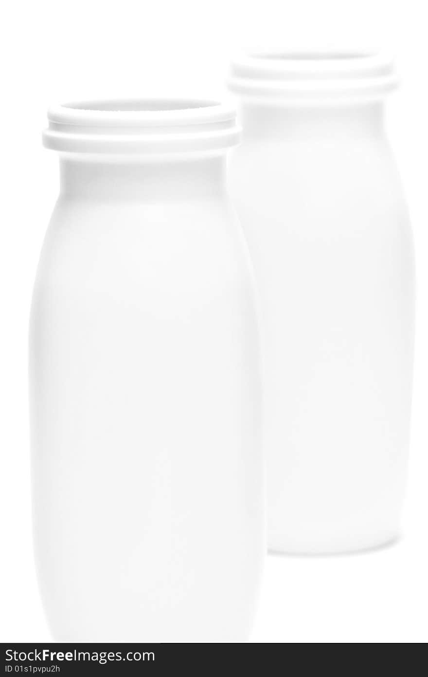 Two Jars With Milk