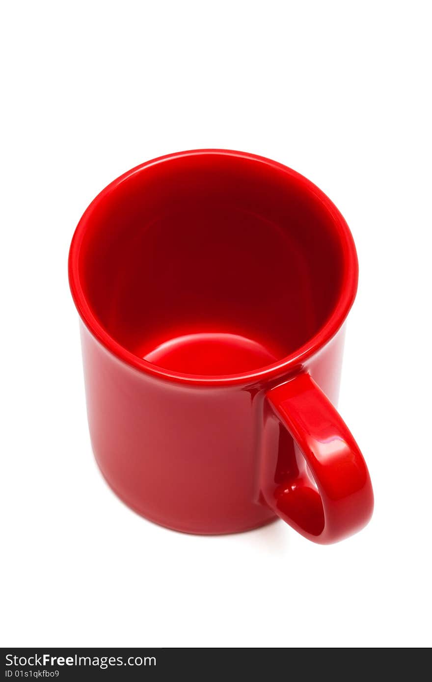 Beautiful red cup on a white background