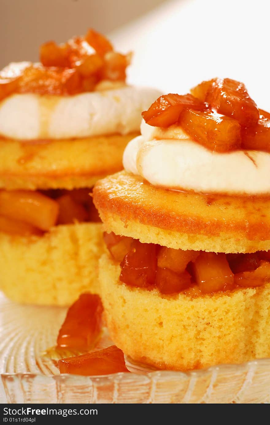 Freshly baked pineapple and Amaretto cupcakes with a vanilla icing