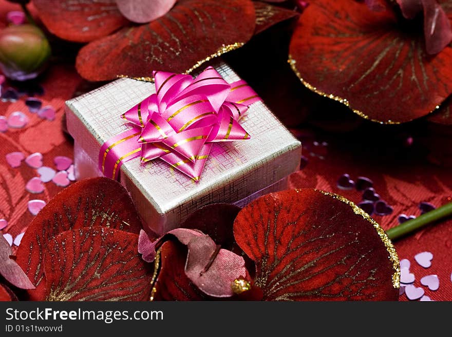 Gift box with red flowers