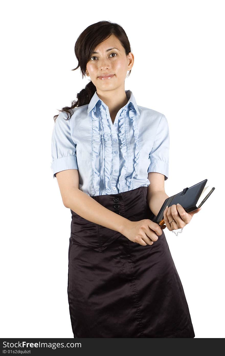 Chinese office lady, elegant clerk. Young Asian girl with kind face expression. Holding pen and notebook, reading and making notes. Chinese office lady, elegant clerk. Young Asian girl with kind face expression. Holding pen and notebook, reading and making notes.