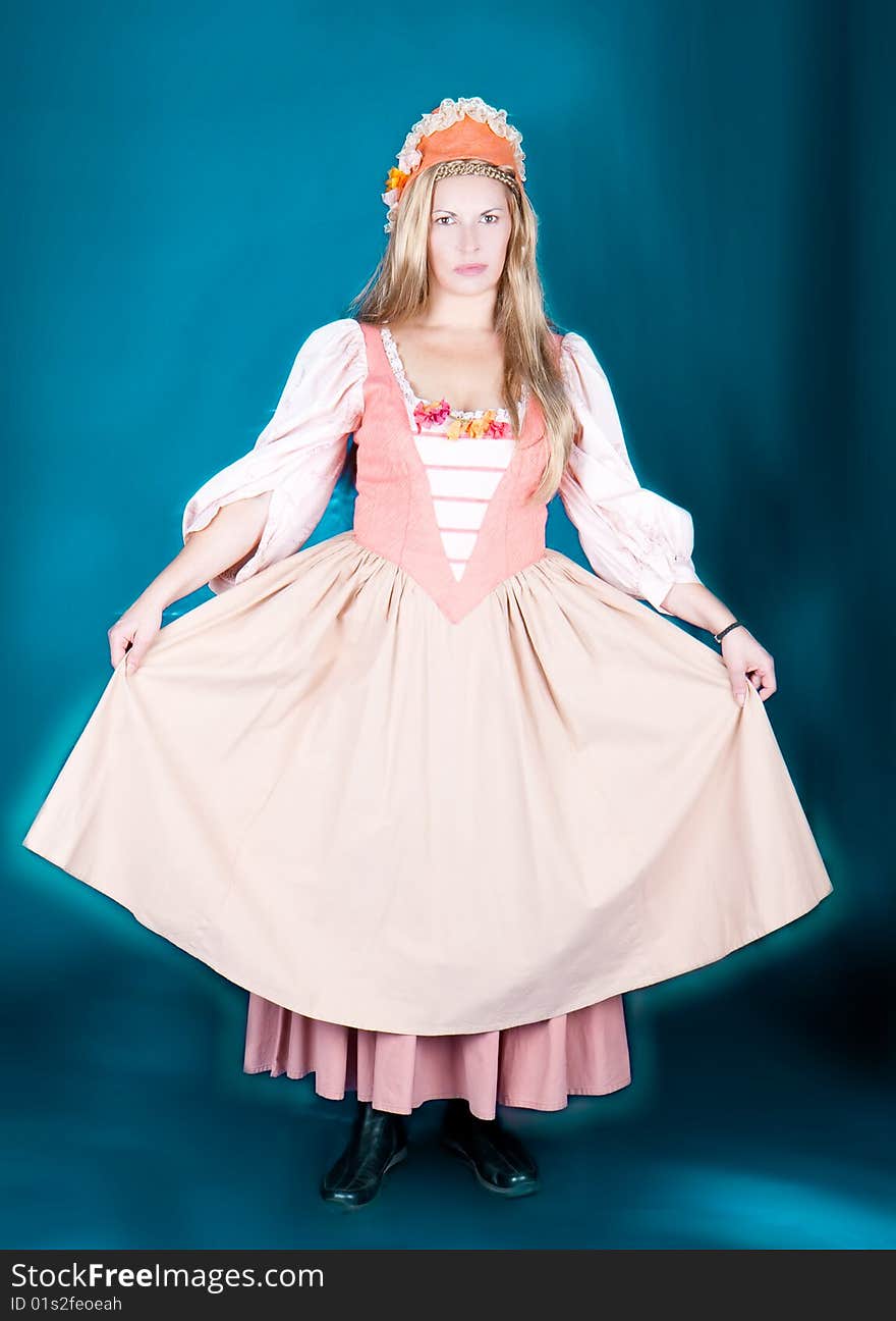 Great fancy-dress woman in Renaissance style, studio shot