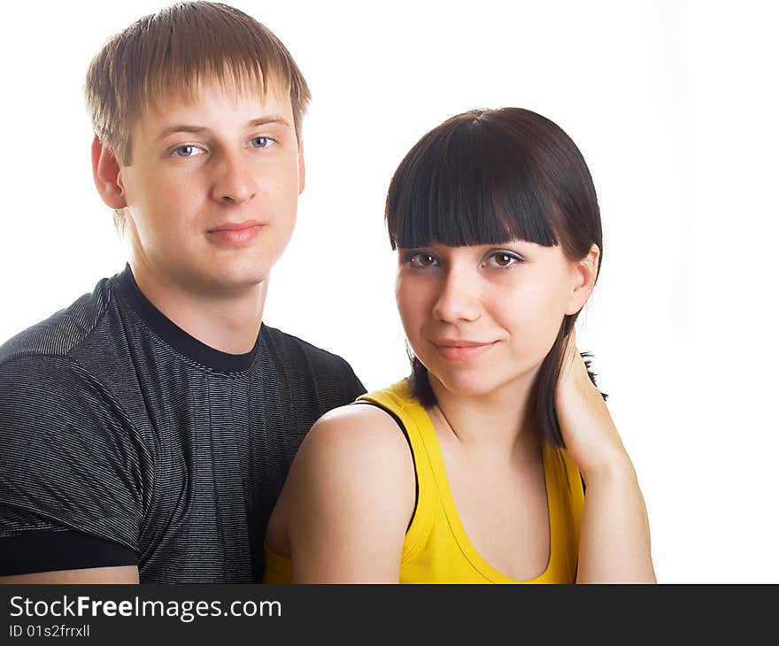 Portrait of young happy pair on a white background. Portrait of young happy pair on a white background