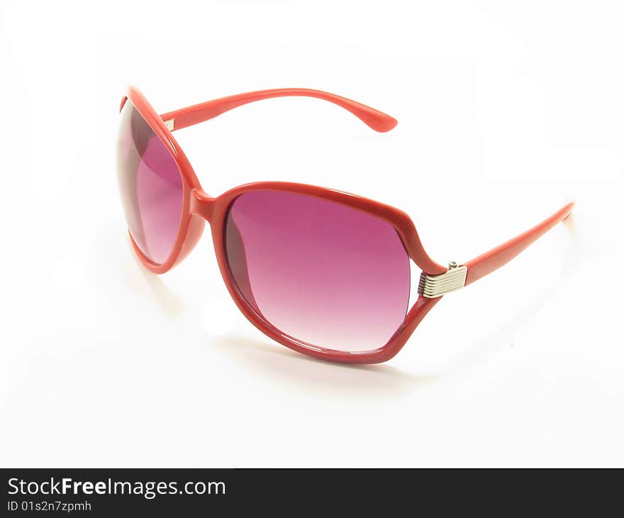 Red sunglasses isolated on white