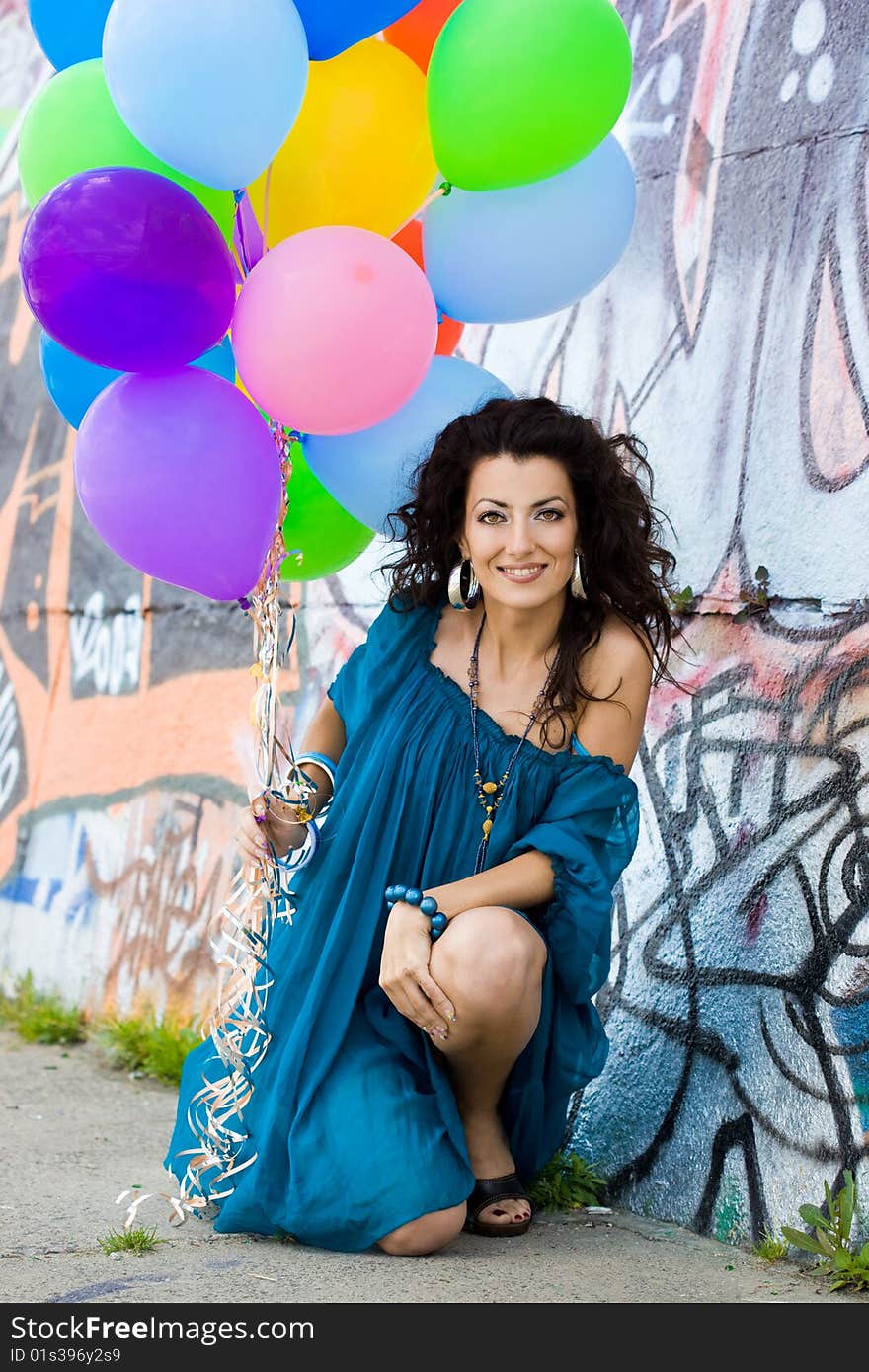 Happy woman with colorful balloons. Happy woman with colorful balloons