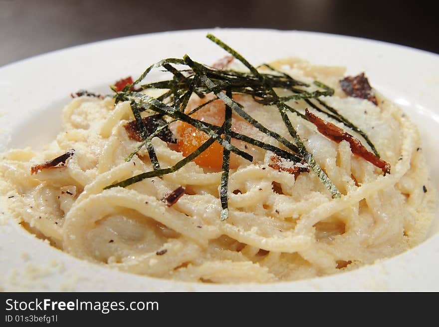 Italy seafood noodles on white dish